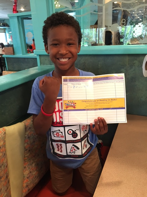 The kids were proud and excited to receive their bracelets as rewards for reading, courtesy of the Suncoast Campaign for Grade-Level Reading
