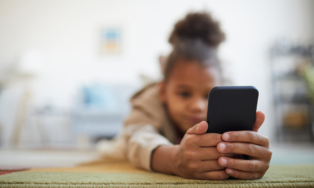 young student on cell phone