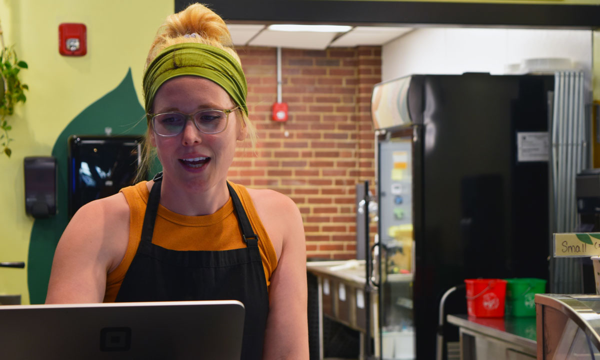 This photo is of Haley Radomski working at an ice cream shop