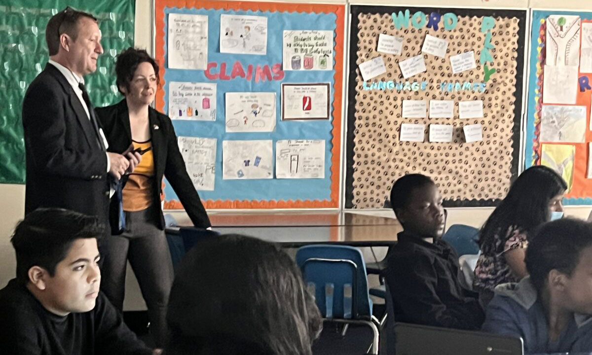 Two adults visit a classroom in North Carolina