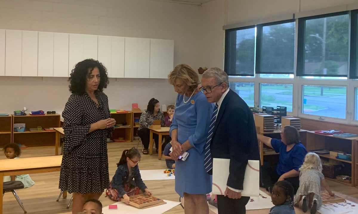 This is a photo of Rekha Kohli, director of student and family services at Columbus Montessori Education Center, talking with Ohio Gov. Mike DeWine and First Lady Fran DeWine.