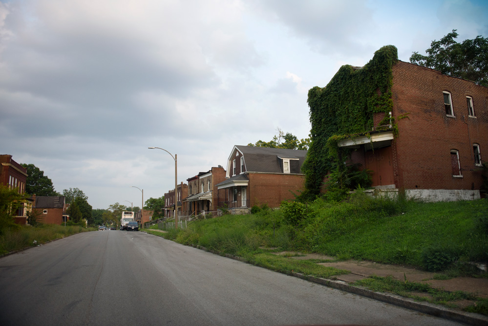 A photo of abandoned and decrepit houses in a neighborhood in St. Louis