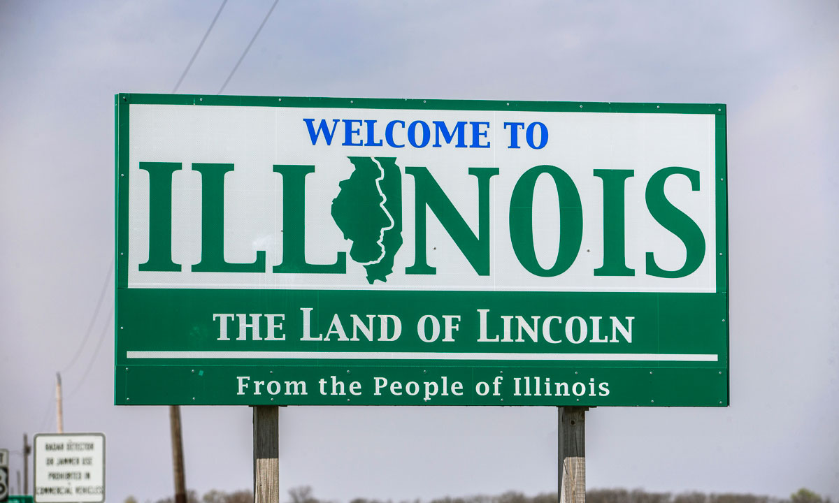 This is a photo of a "Welcome to Illinois" sign.