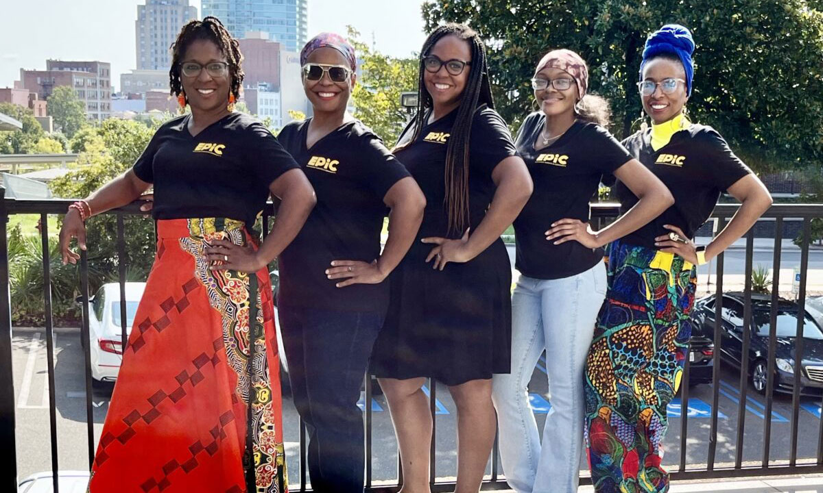 This is a photo of founder and executive director of EPiC, Jovonia Lewis, and her team.