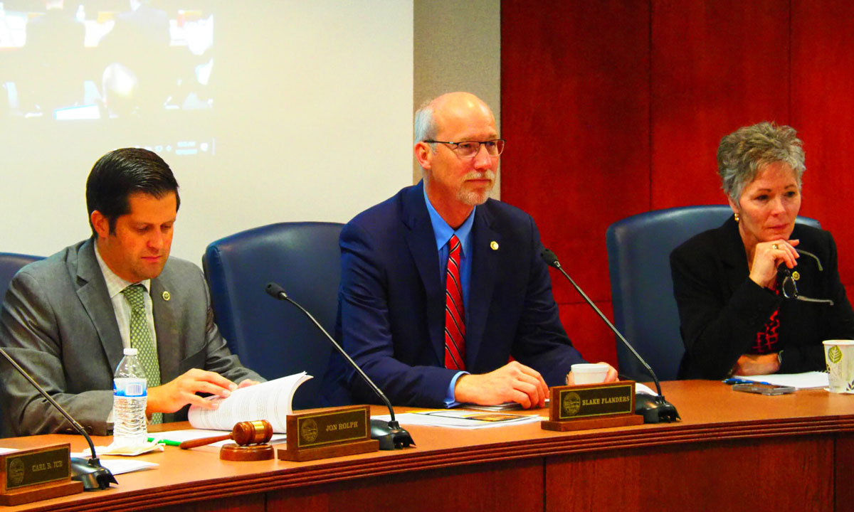 This is a photo of president and CEO of the Kansas Board of Regents, Blake Flanders and other board members.