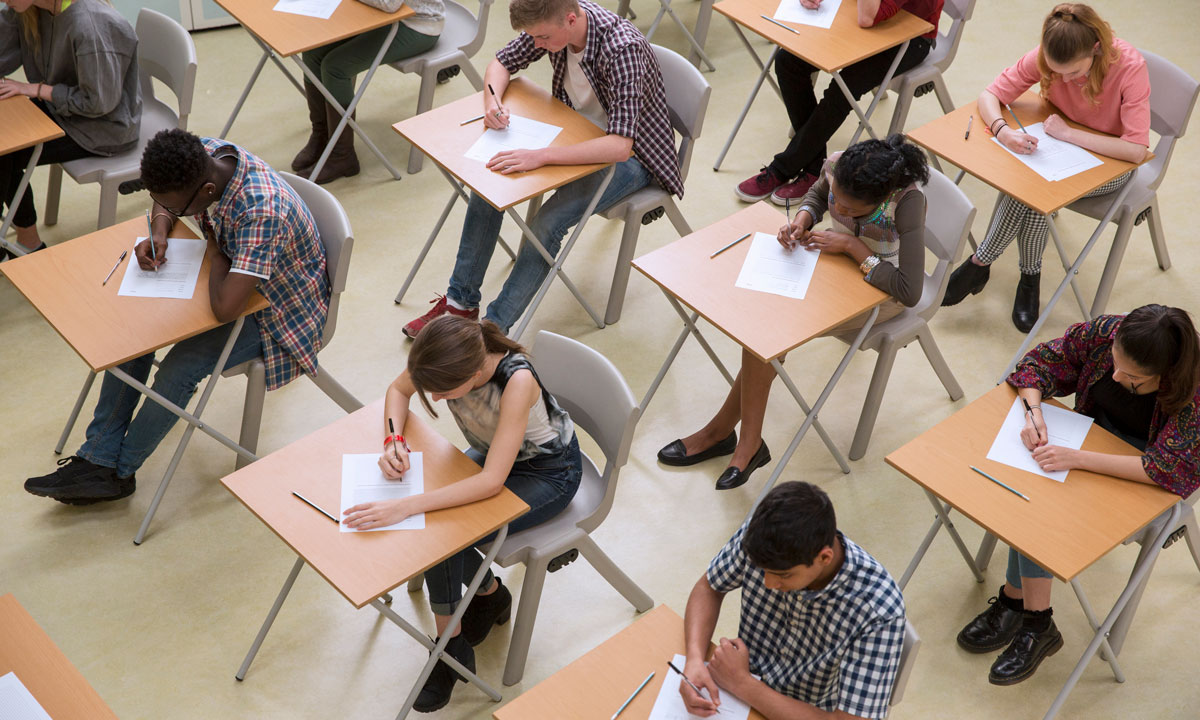 This is a photo of students taking exams at their desks.