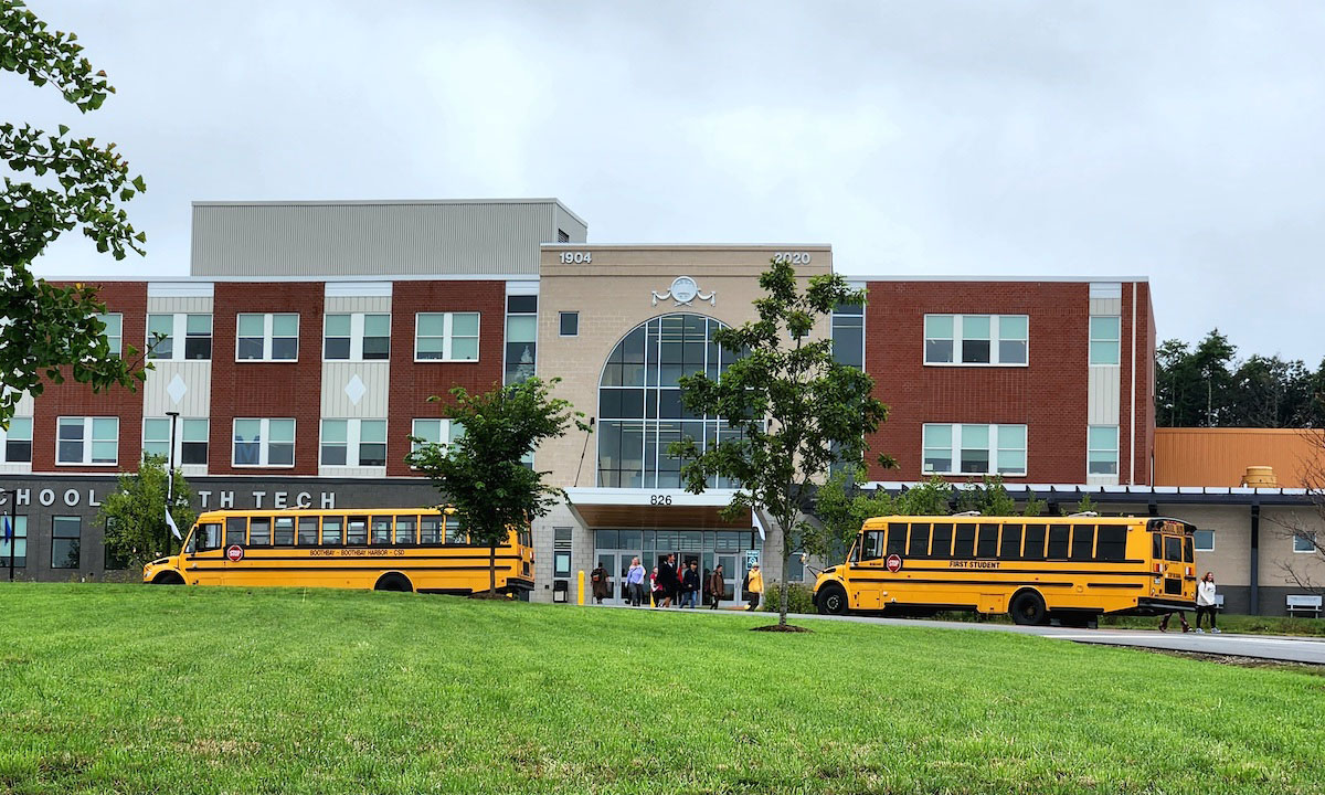 This is a photo of buses in front of Morse High School in Bath, Maine.