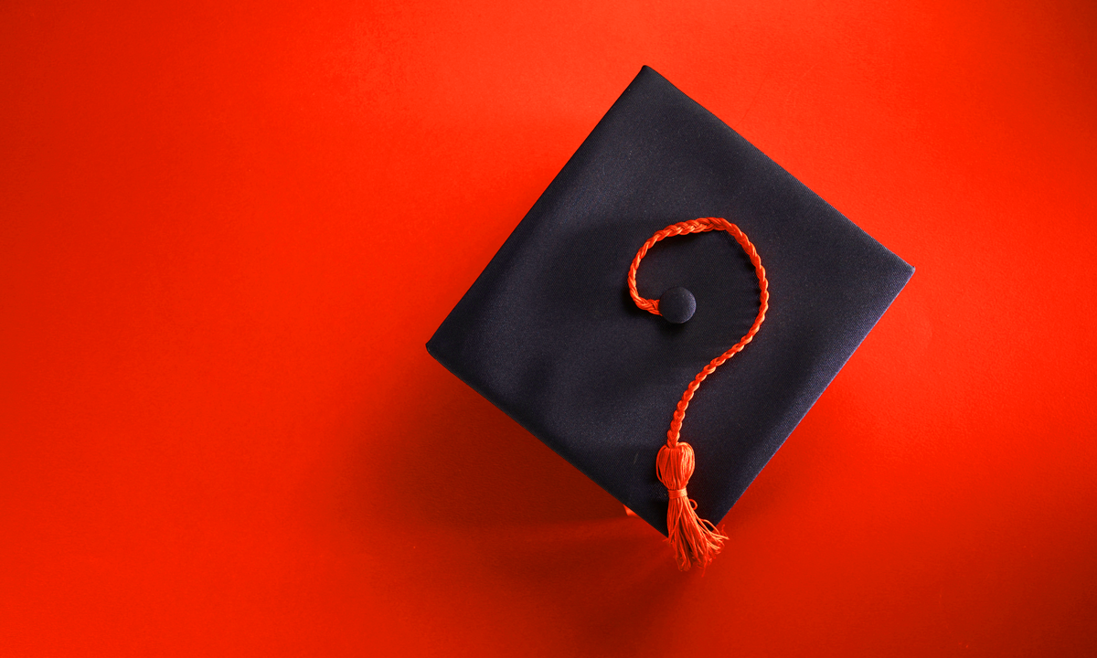 A graduation cap with the tassel in the shape of a question mark