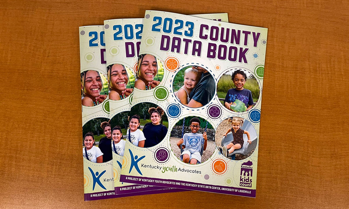 This is a photo of Kentucky Youth Advocates' 2023 KIDS COUNT books