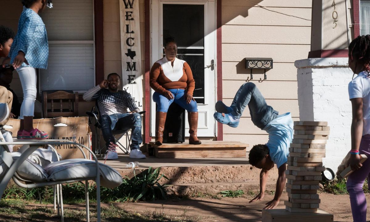 Nikki Murray watches her grandson, nieces and nephew play outside her home in Vernon on Dec. 3.