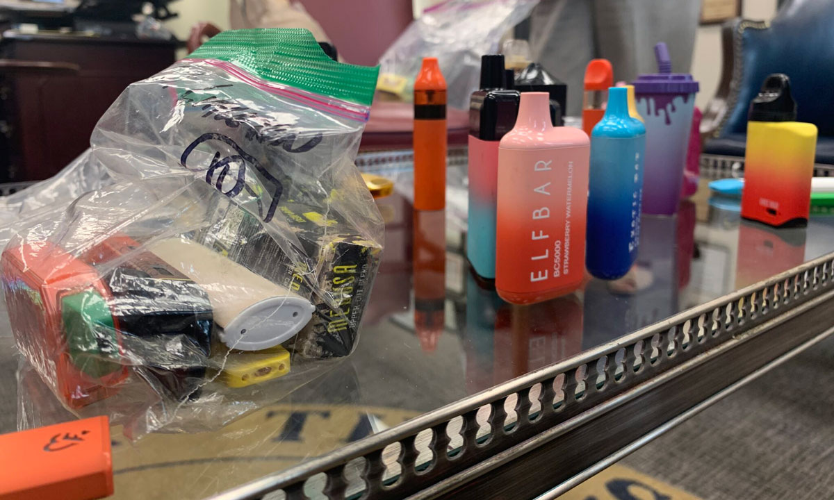 This is a photo of e-cigarettes on a table.